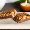 Two halves of a chocolate raisin bar meal replacement