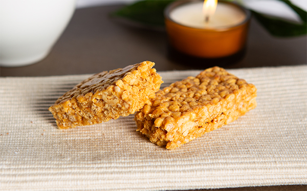 Two halves of a VLCD crispy peanut bar